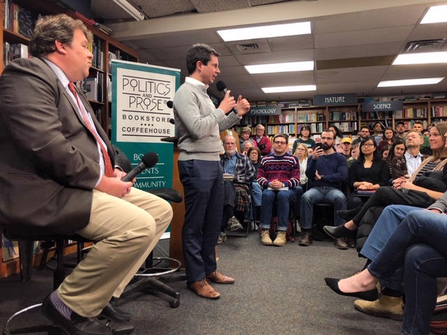 Pete Buttigieg addresses the crowd at Politics and Prose last Sunday night. 